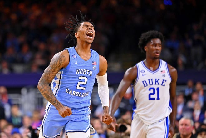 North Carolina Tar Heels guard Caleb Love (2) reacts after a game against the Duke Blue Devils during the first half during the 2022 NCAA Men's Basketball Tournament Semifinals at Caesars Superdome.