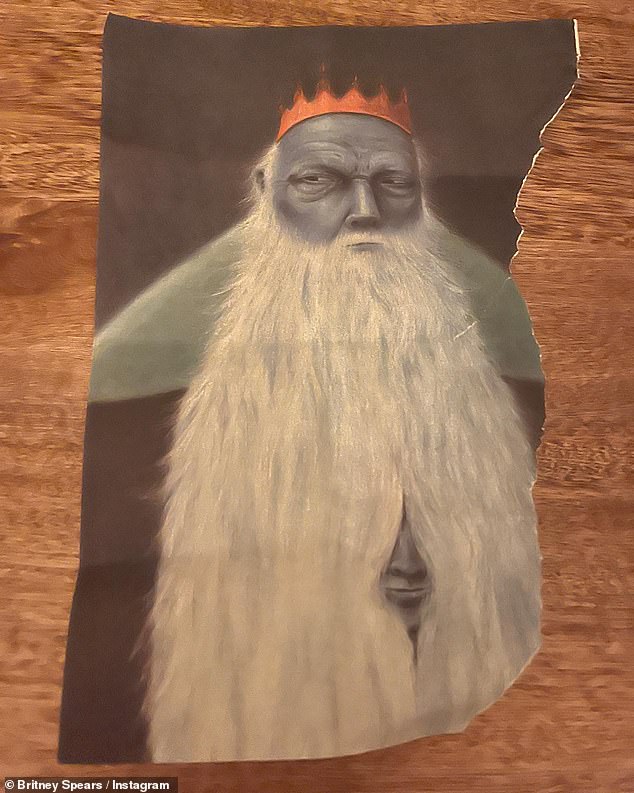 Spears posted a shot of a blue man wearing a king's crown with a long white beard