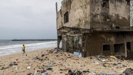 As countries argue over who should pay for the climate crisis, a community on the island of Lagos is swallowed up by the sea 