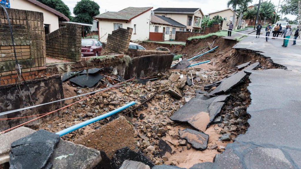 South African floods kill 59 people and swarm roads