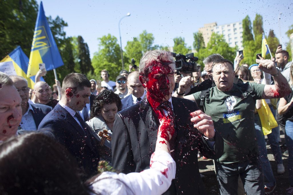 Russian envoy to Poland collides with red paint in a war cemetery