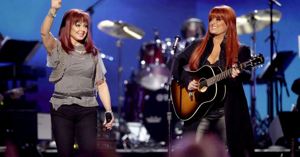 The Judds are inducted into the Country Music Hall of Fame one day after the unexpected death of Naomi Judd