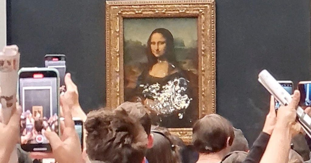 The Mona Lisa smears a cake in an apparent climate protest at the Louvre