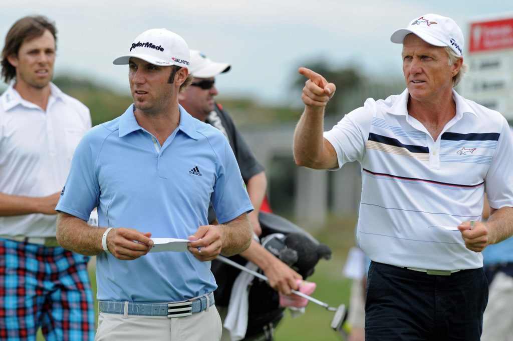 Dustin Johnson (left) and Greg Norman in 2011