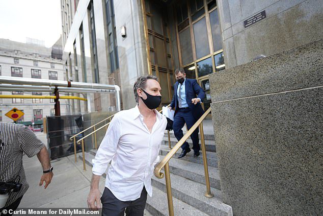 Ben leaves the Criminal Court in Manhattan on Monday afternoon.  He was accused of forcibly touching intimate organs and endangering a minor under the age of 17