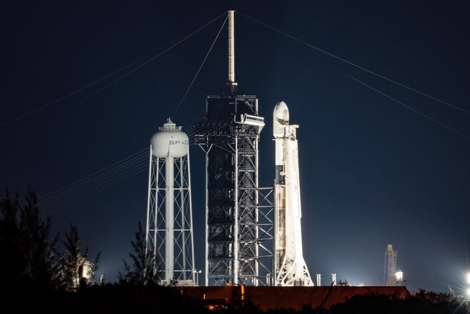 A SpaceX Falcon 9 rocket is on platform 39A at the Kennedy Space Center along with the company's 48th batch of Starlink Internet satellites on Wednesday, May 18, 2022.