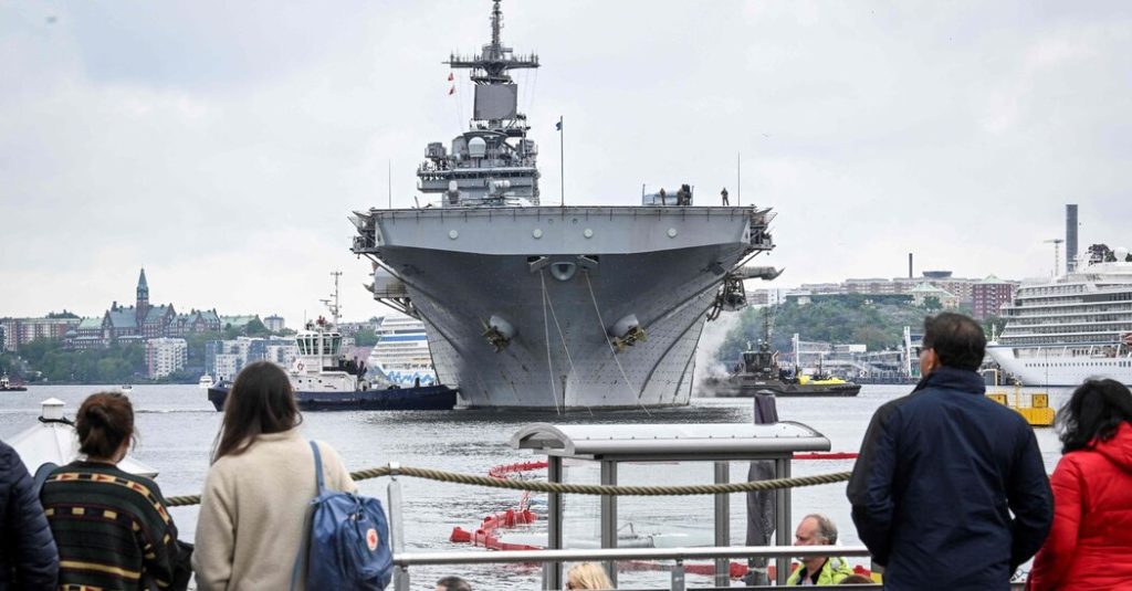 A US warship arrives in Stockholm to conduct military exercises and warn