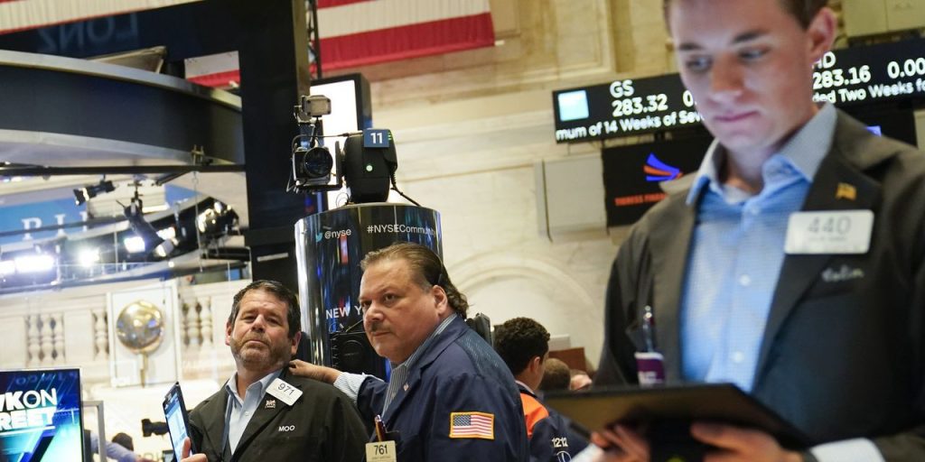 Dow slips when S&P 500 closes higher