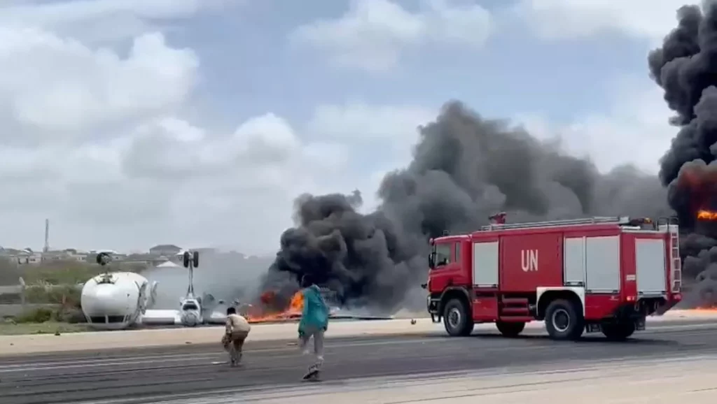 Plane capsizes after plane crashes at Mogadishu airport, Somalia