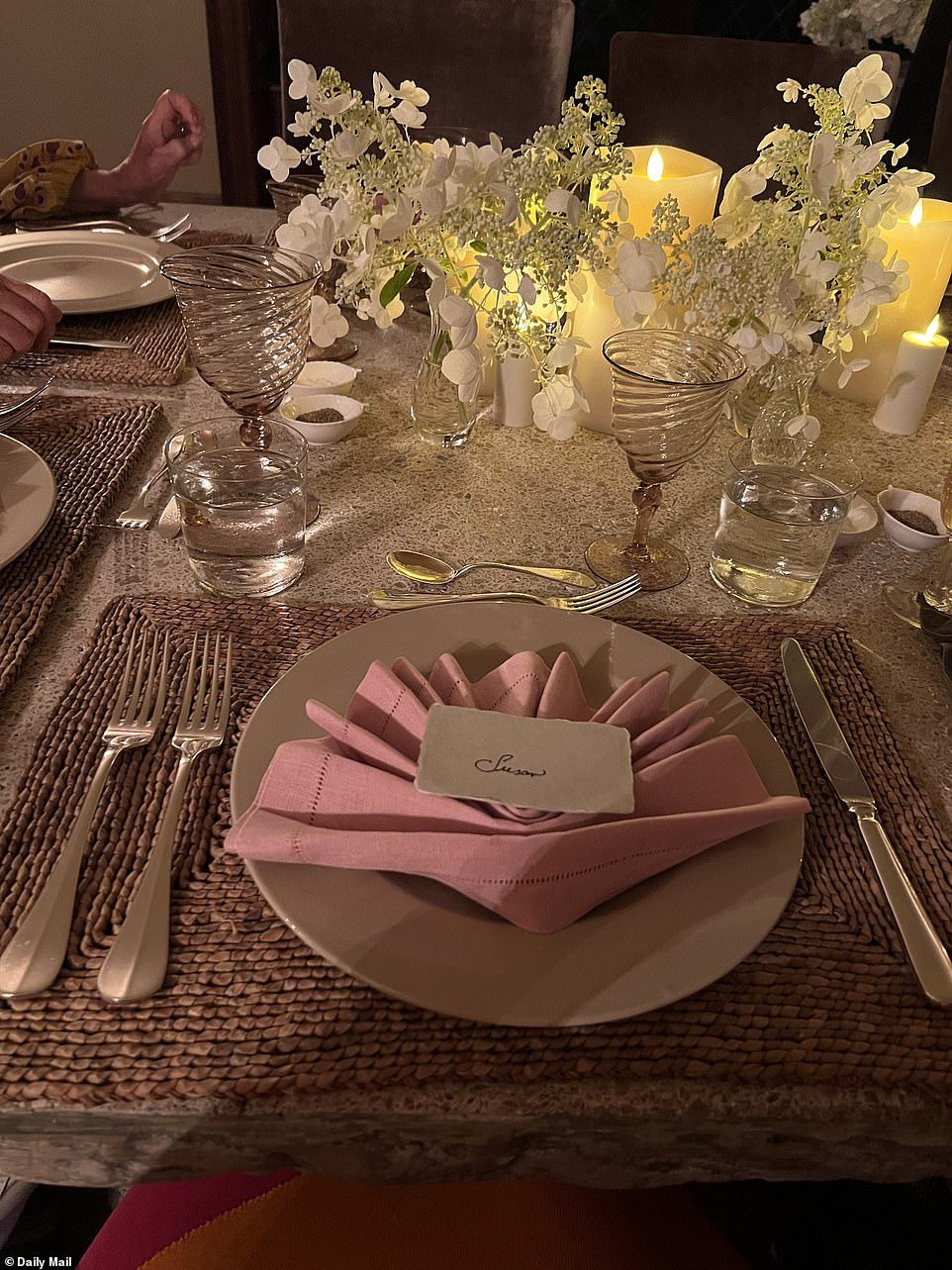 Every detail: The star's place settings feature pink napkins, a stunning touch