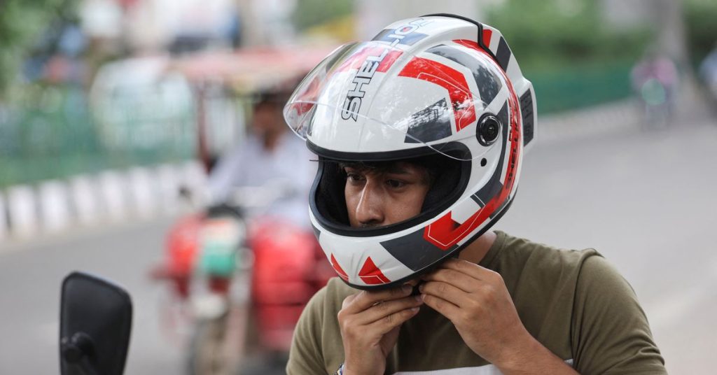 India's state-funded helmet promises 'clean air' in battle against winter smog