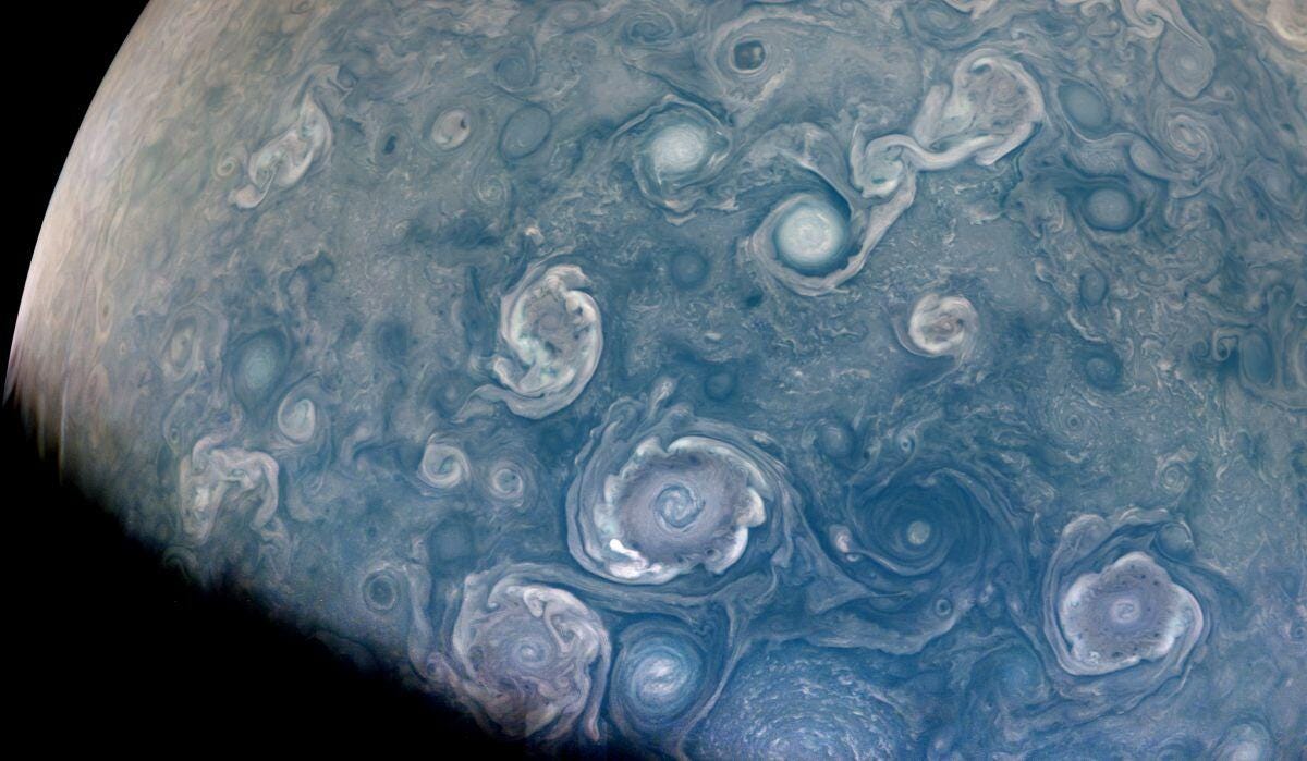 NASA image of vortex-like vortices representing giant storms on Jupiter.