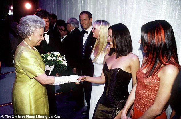 From the heart: Victoria Beckham wrote a touching tribute to Queen Elizabeth II in the wake of her death on her Instagram account on Sunday (Pictured: The Queen shaking hands with Victoria at a royal command performance in 1997)