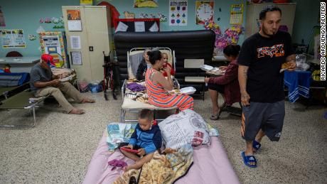 Hurricane evacuees take refuge in a public school in Guayanila, Puerto Rico.