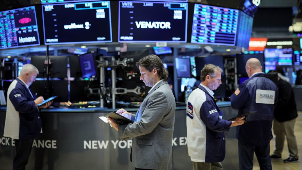 Stock futures hold steady as Wall Street eyes key inflation data