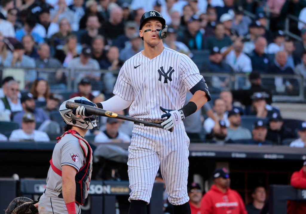 Cleveland Guardians vs. New York Yankees at Yankee Stadium - New York Yankees right-hander Aaron Judge #99 reacts after being knocked out in the seventh inning.