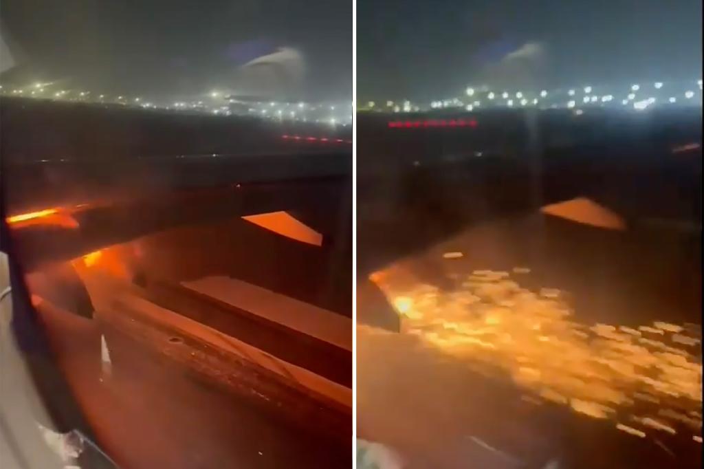 Plane catches fire while taking off from Delhi airport: video