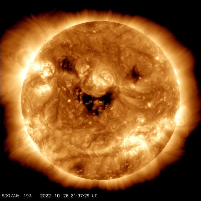 NASA takes a picture of the "smiling" sun.  It's not as cute as it seems.