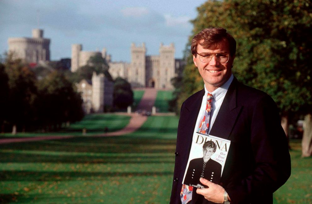 Photo: Author Andrew holds a copy of his book in front of Windsor Castle.