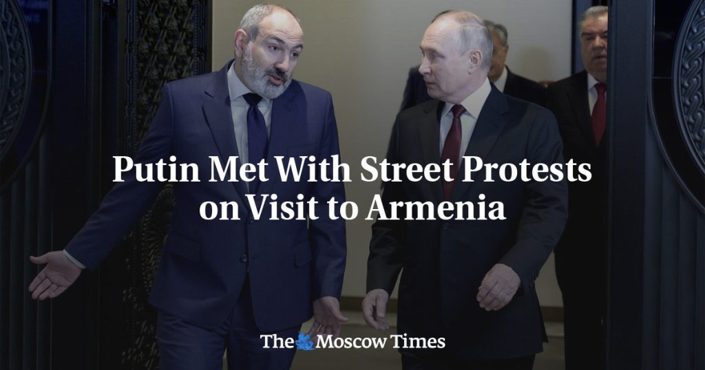 Putin met street protests during his visit to Armenia