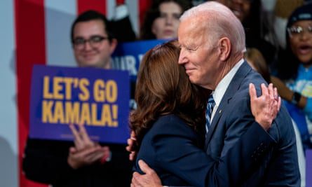 Joe Biden and Vice President Kamala Harris embrace at a post-election Democratic event in Washington on Thursday.