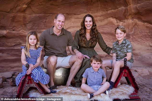 Prince William and Kate chose a family holiday photo for their Christmas card last year (pictured)